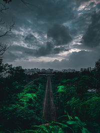 High angle view of railroad tracks against cloudy sky