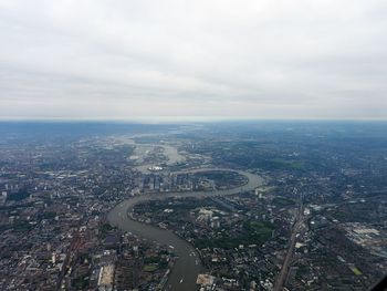 High angle view of buildings in city against sky