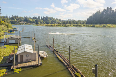 Boats moored in lake