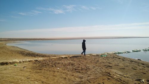 Man walking at beach