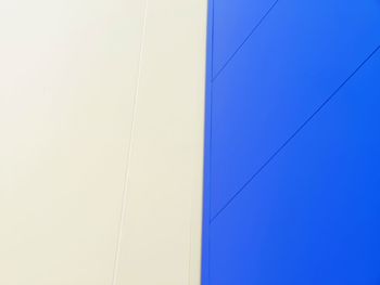 Low angle view of building against clear blue sky