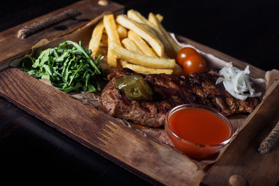 High angle view of meat and vegetables on table