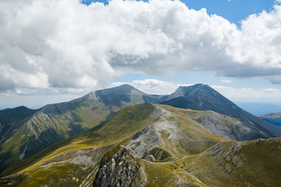 Scenic view of mountains against sky in montemonaco, marche italy 