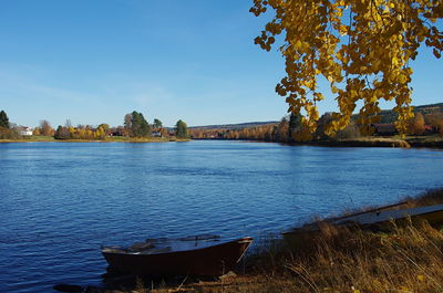 Scenic view of lake against sky during autumn