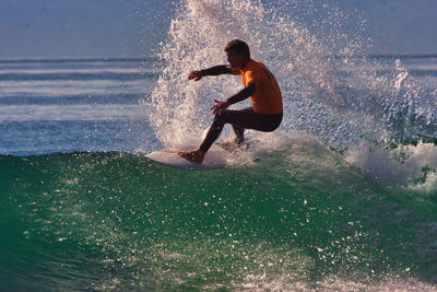 Man surfing in sea