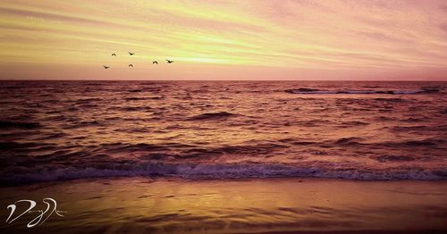 Scenic view of sea against sky during sunset