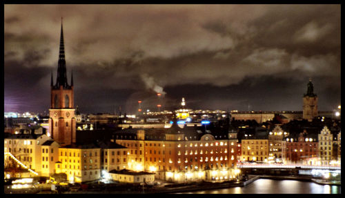 Illuminated cityscape at night