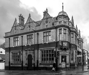 View of building against cloudy sky