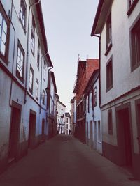 Narrow alley along buildings