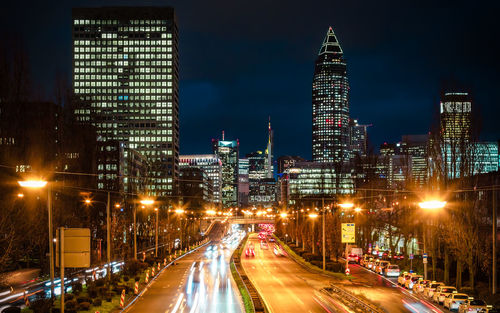 Illuminated buildings in city at night