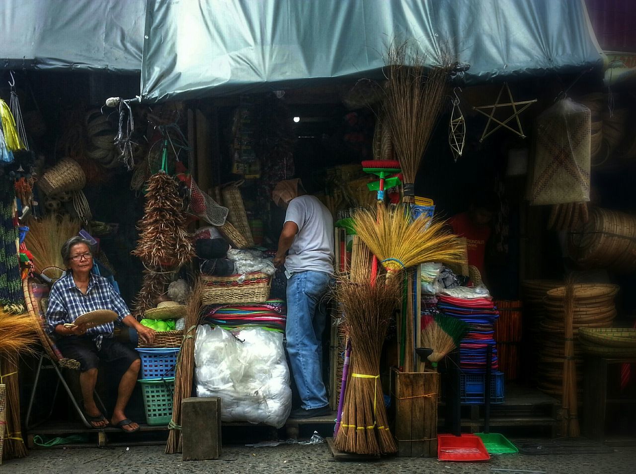 retail, for sale, market stall, market, casual clothing, store, celebration, lifestyles, standing, building exterior, rear view, choice, variation, street, outdoors, small business, multi colored, display