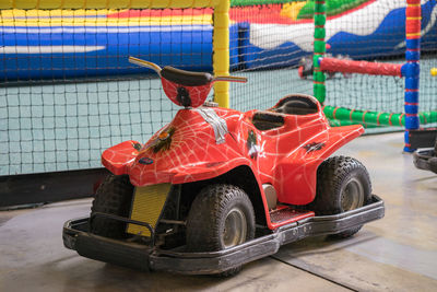 Toy vehicle on floorboard