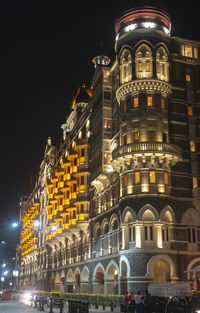 Low angle view of illuminated building at night