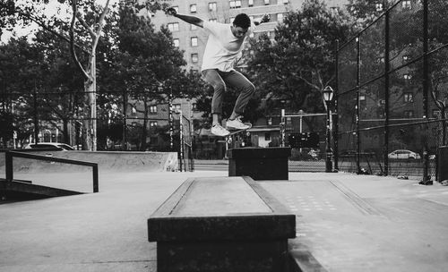 Man skateboarding on skateboard park