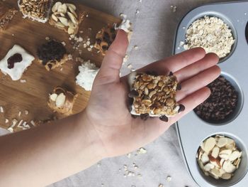 Cropped image of woman eating food