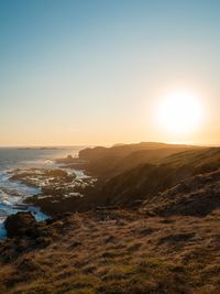 Scenic view of sea against sky during sunset
