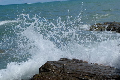 Waves splashing on rocks