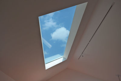 Low angle view of sky seen through window