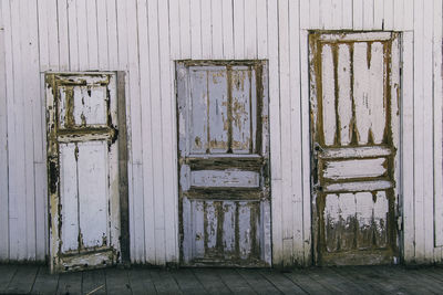 Closed doors of abandoned house