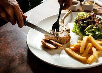 Close-up of food served on table