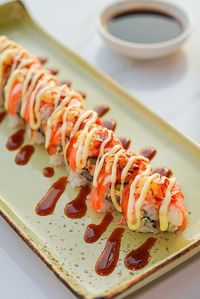 Close-up of sushi in plate on table