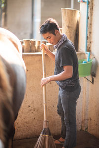 Full length portrait of woman working