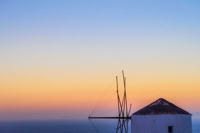 Scenic view of sea against clear sky during sunset