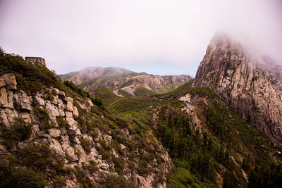 Scenic view of rocky mountains against sky