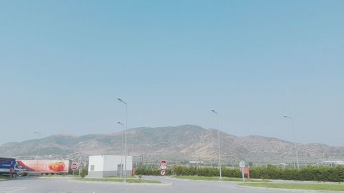 Landscape with mountain range in background