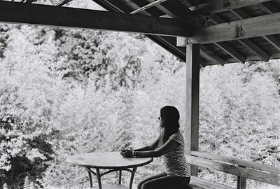 Woman sitting on seat