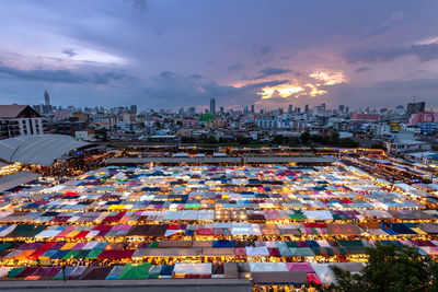 High angle view of buildings against sky at sunset