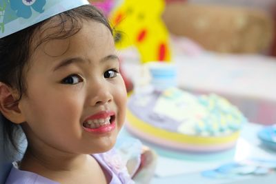 Portrait of cute girl during birthday party