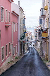 An empty old street leading to the ocean, in the historic center of the portuguese city of nazare