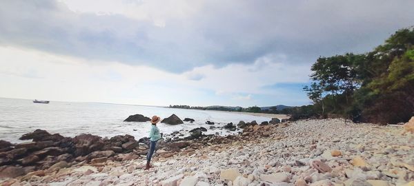Scenic view of beach against sky