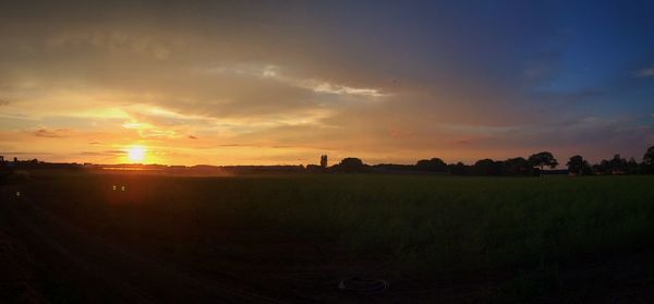 Scenic view of landscape at sunset