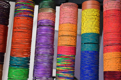 Full frame shot of multi colored bangles sale at market stall