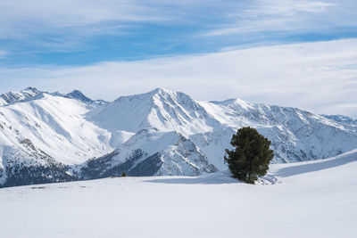 Snowcapped mountains against sky