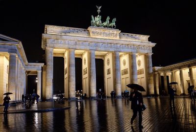 Low angle view of historic building at night