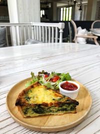 Close-up of breakfast served on table