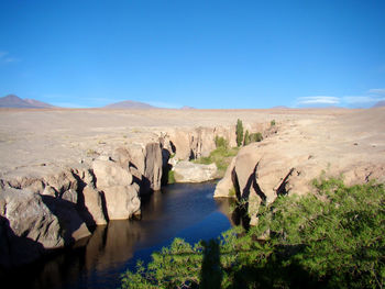 Scenic view of rocks in stream