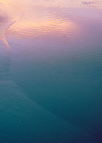 Scenic view of sea against sky at sunset