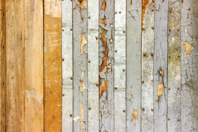 Vintage whitewash painted rustic old wooden shabby plank wall textured background