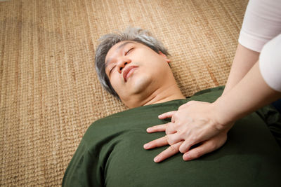 Portrait of a beautiful young woman lying down