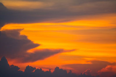 Low angle view of dramatic sky during sunset
