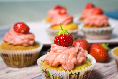 Close-up of cupcakes on table