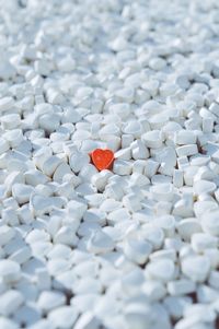 Close up of red heart-shaped candy