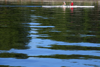 Low section of people standing in water