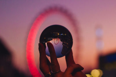 Reflection of woman photographing on mirror