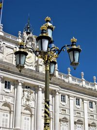 Low angle view of building against blue sky