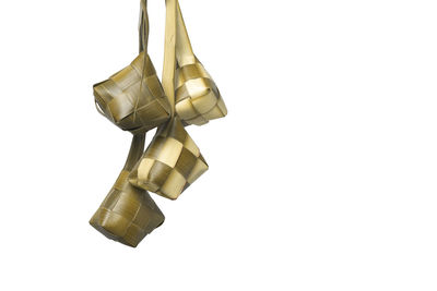 Close-up of light bulb against white background